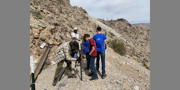 An Eagle Scout candidate in Las Vegas assists the Division by securing two abandoned mine hazards near the town of Goodsprings, NV. Photo taken on 3/19/2022.